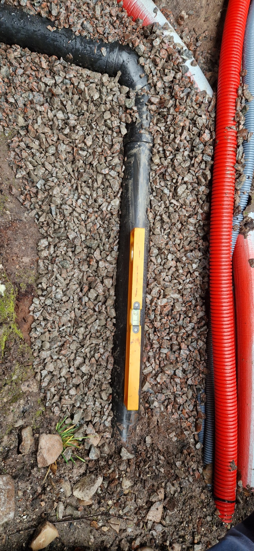 Kontroll av fall på avløpet fra kjøkken